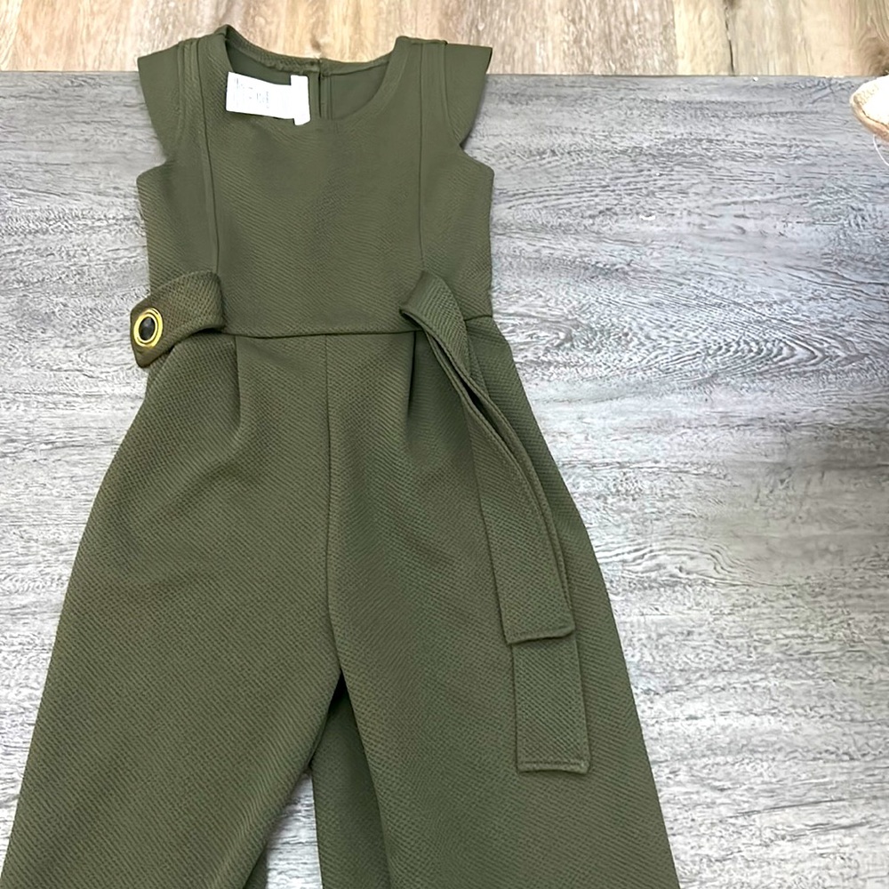 Green romper.